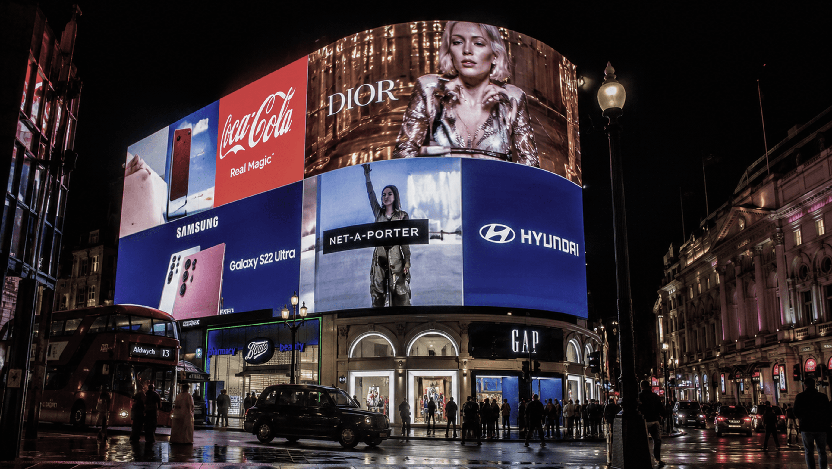 Out-of-home billboards lighting up Piccadilly Circus at night