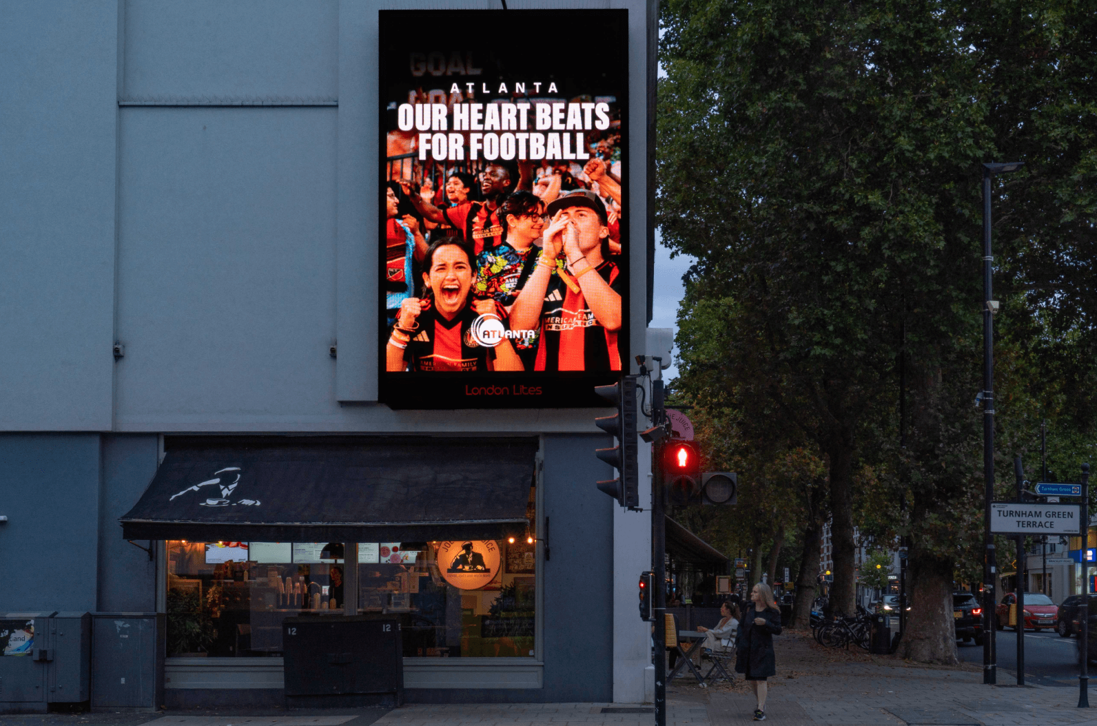 Atlanta ‘Our Heart Beats For Football’ billboard with cheering fans