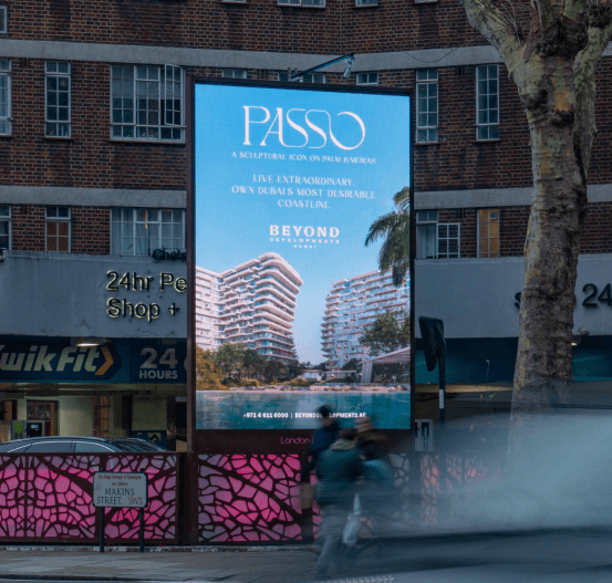 Passo billboard above a KwikFit garage