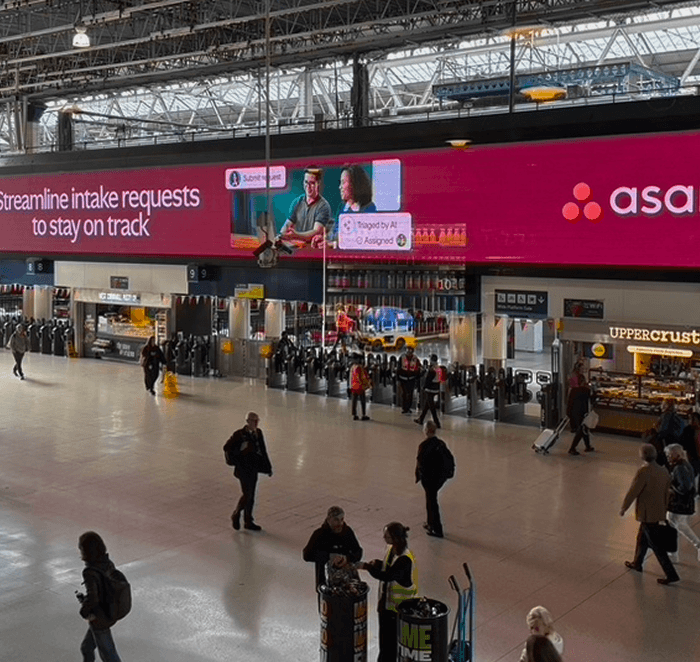Asana out-of-home billboard above the concourse at London Waterloo station