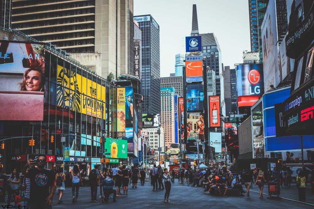 Times Square in New York City filled with digital billboards and crowds